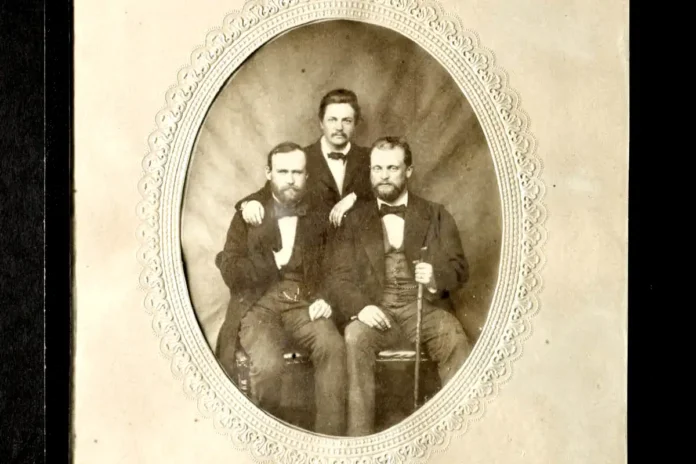 Photograph on salt or albumen paper, portrait of three young men in Uppsala, ca. 1850-1860. Standing at the back, Artur Hazelius. Photo: Mats Landin (CC0)